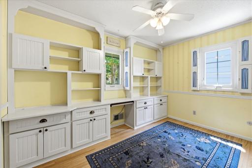 2 of 3 bedrooms on the main floor with built-in cabinets