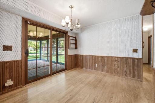 Sliding doors open from the dining room into the porch