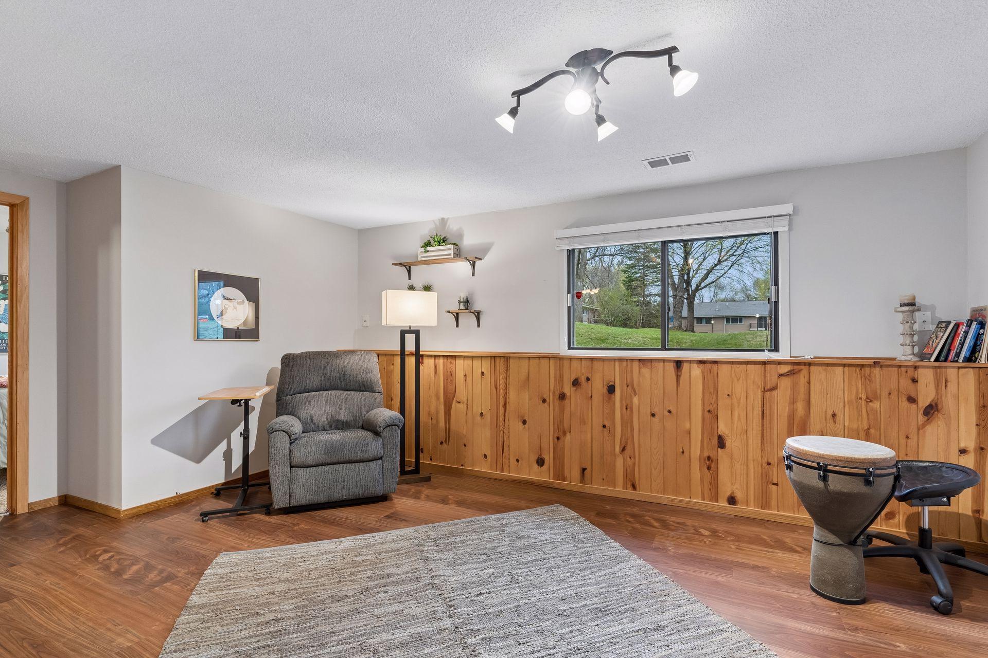 Knotty pine panels and wood floors