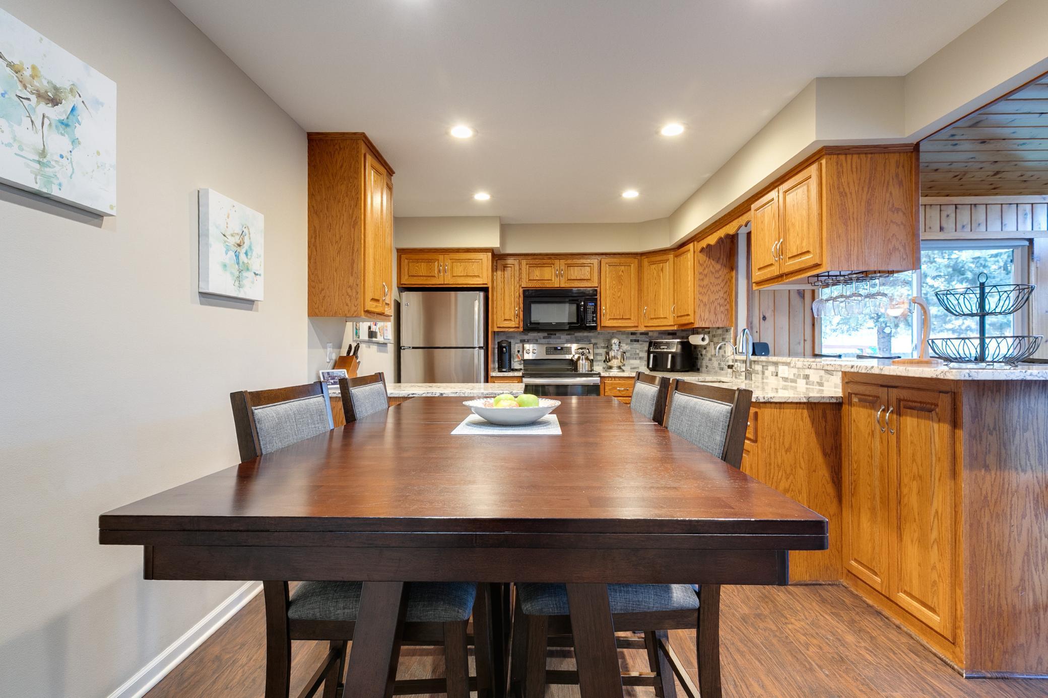 Informal dining area comfortably seats four to six diners