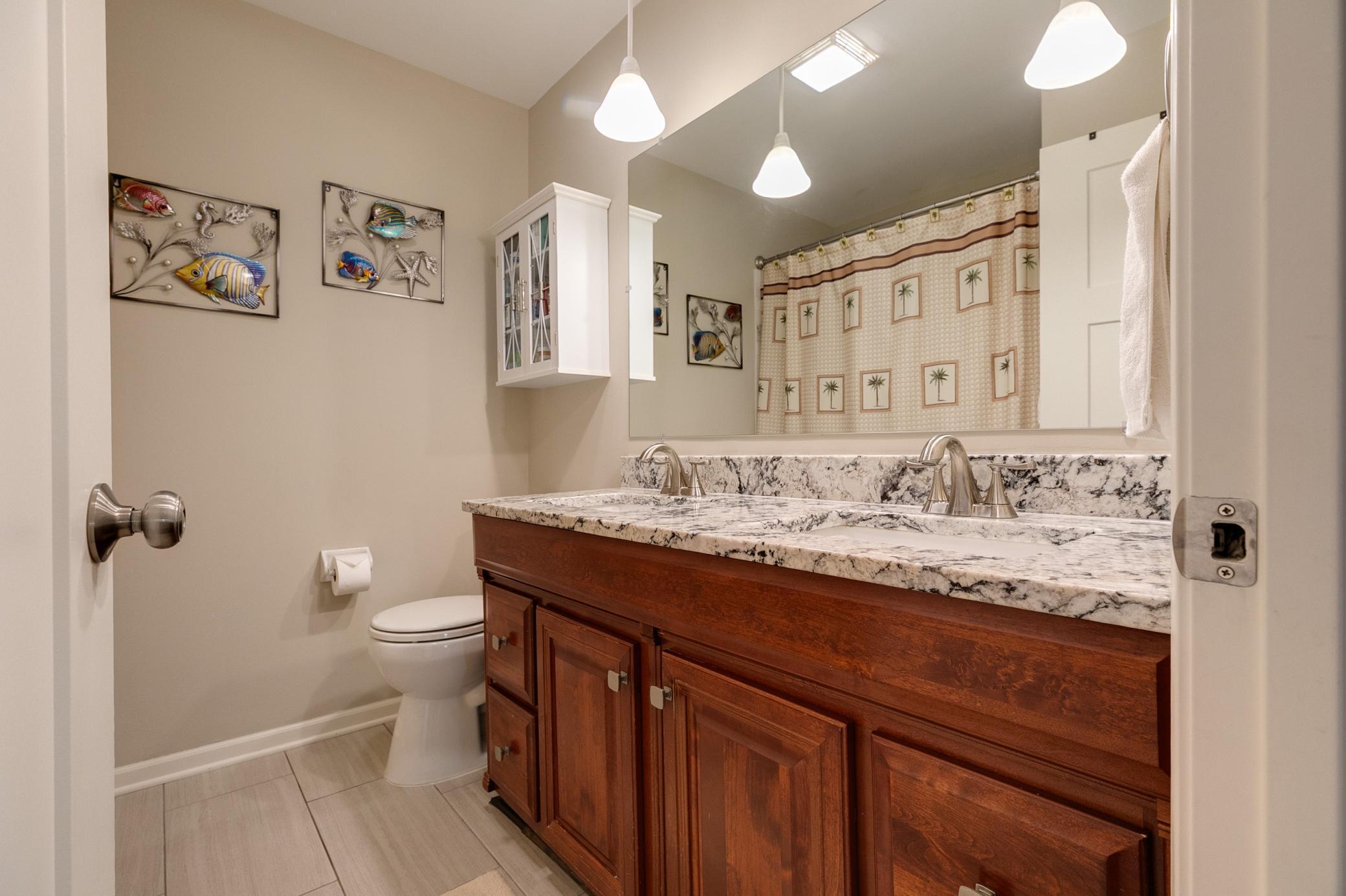Main level full bathroom granite countertop (2021)