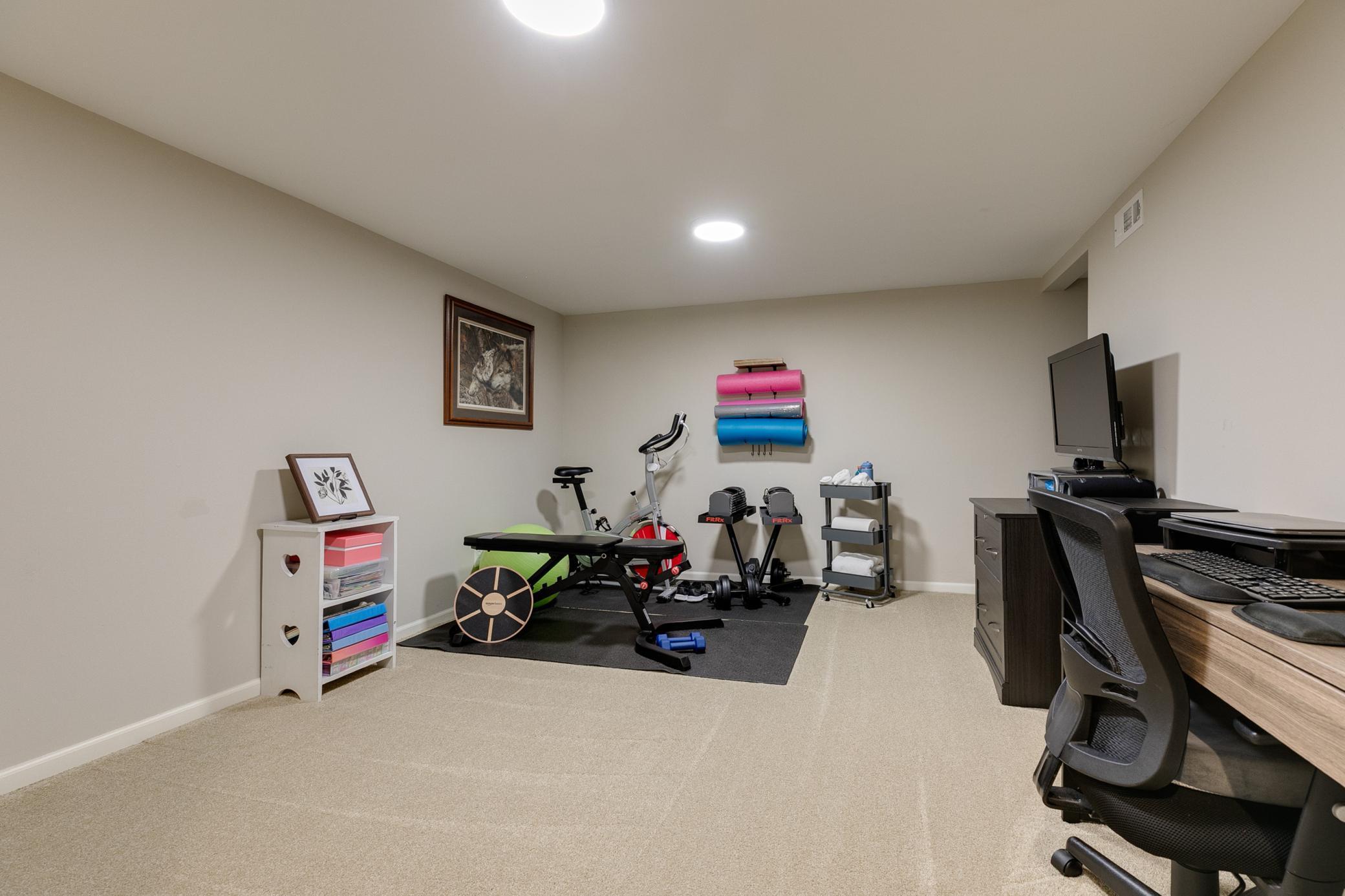 4th bedroom at the lower level can be transformed into an exercise room, a home office or a guest bedroom