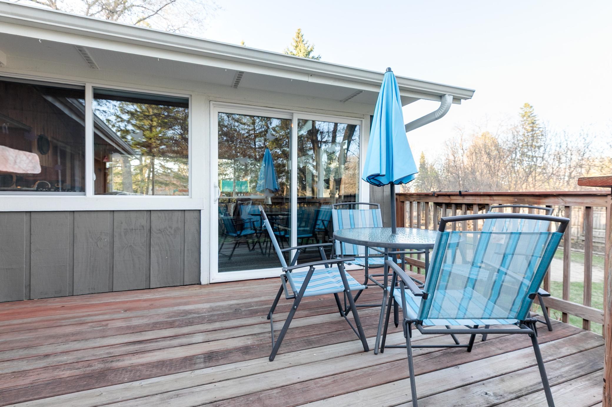 Step outside and enjoy the spacious deck overlooking the fully fenced backyard