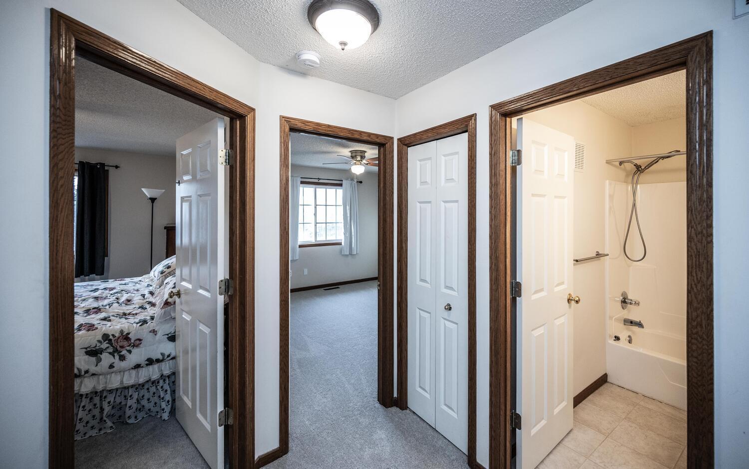 The hallway provides access to 2 bedrooms and a full hall bath. Brand new carpet in the bedrooms and hallway.