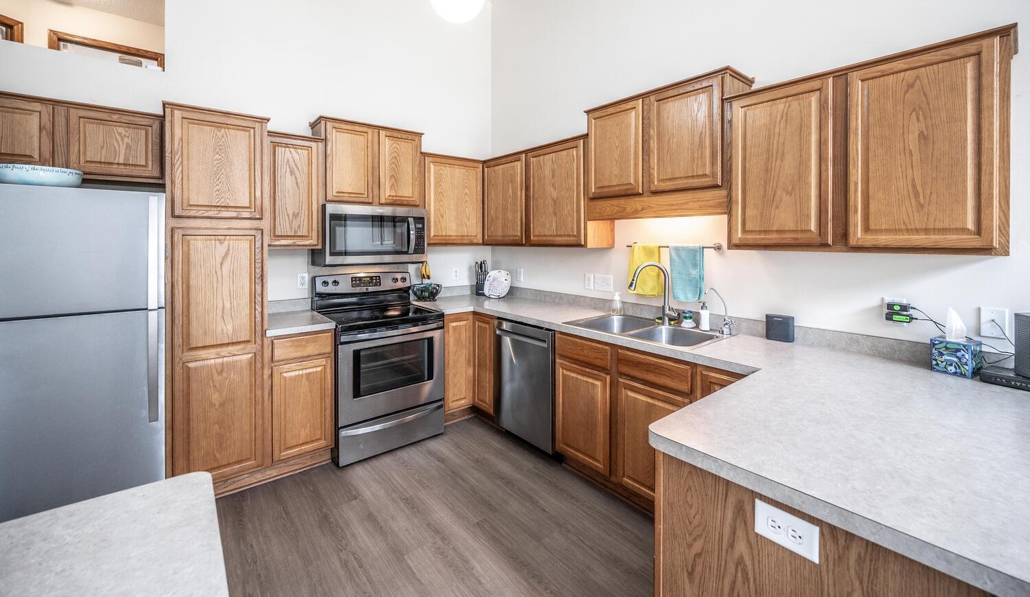 Plenty of room to move around in this kitchen! Flooring is brand new!