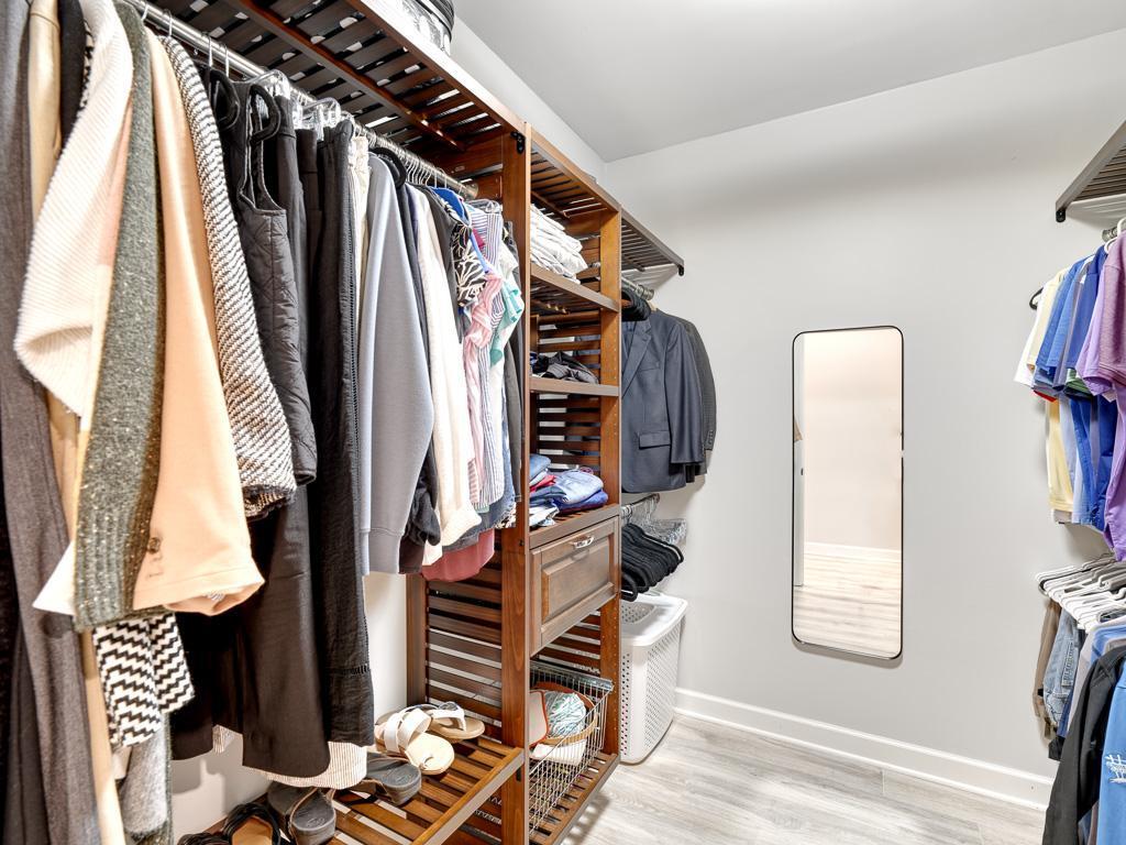 Great built-ins in the primary suite walk-in closet!