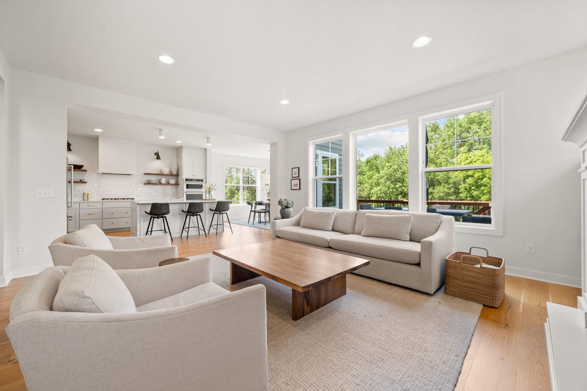Great Room features floor to ceiling windows with incredible views of the property