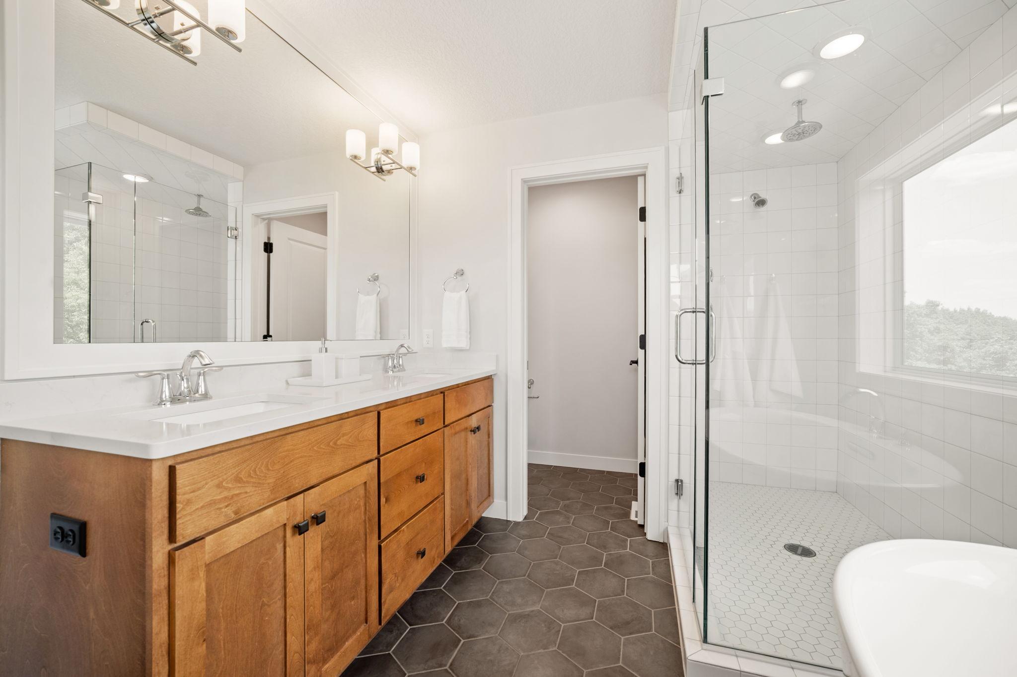 Large vanity cabinet with quartz countertop and dual sinks
