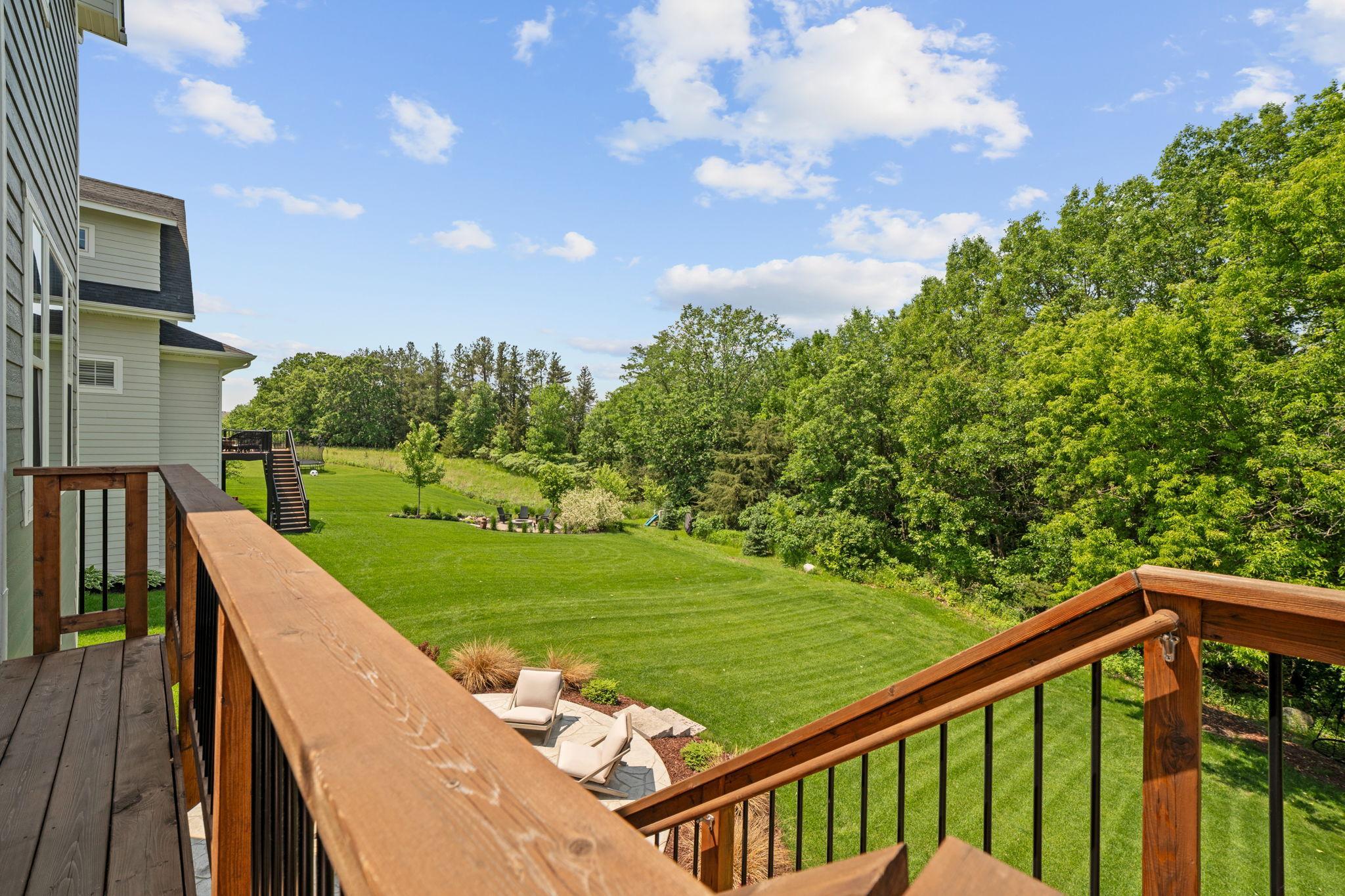 Stairs lead to the patio area and backyard