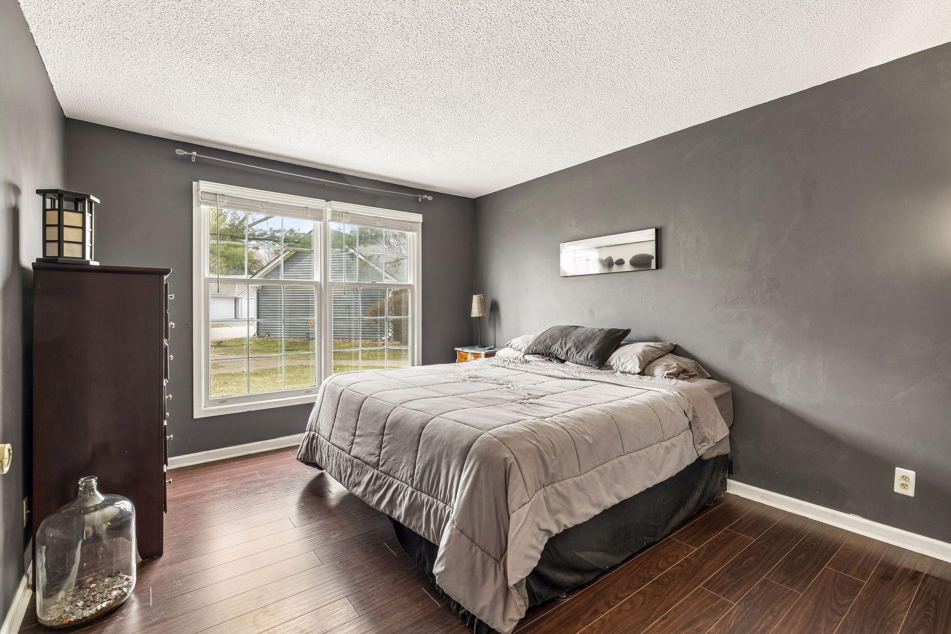 Large primary bedroom easily fits king size bed!