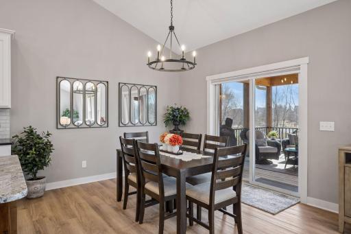 Dining space easily fits a table for 6 and has access to porch!
