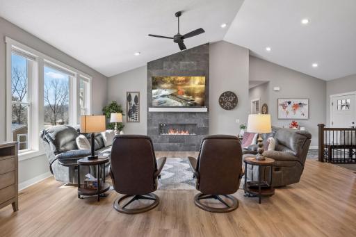 The fireplace and mantle are a centerpiece of this room