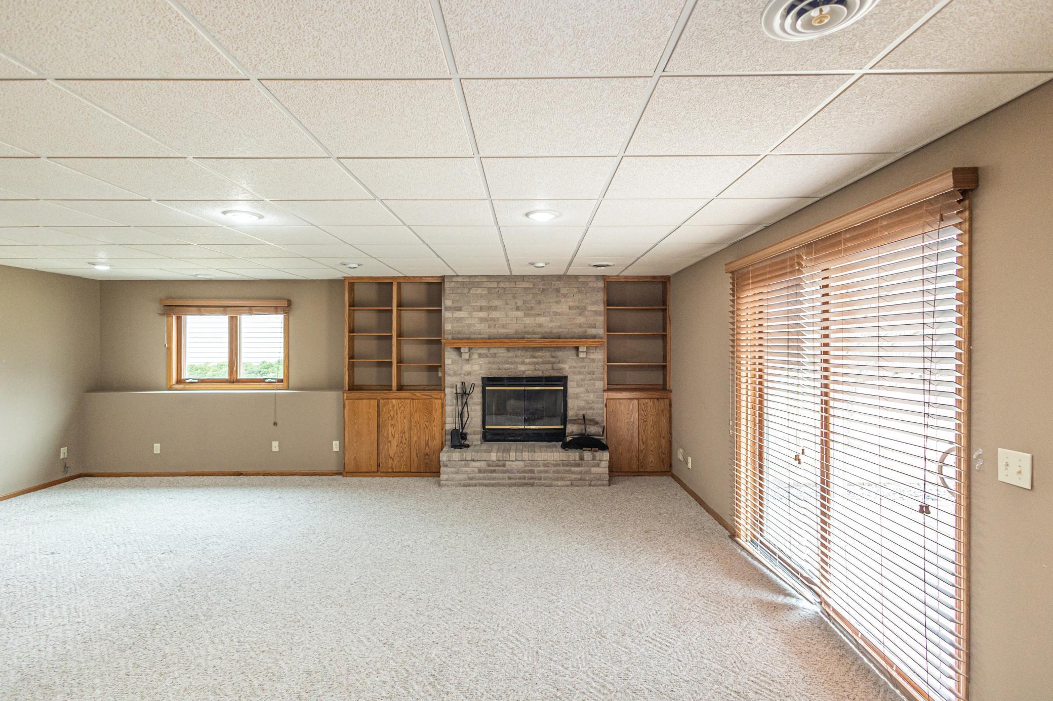 Wood burning fireplace and builtin cabinets