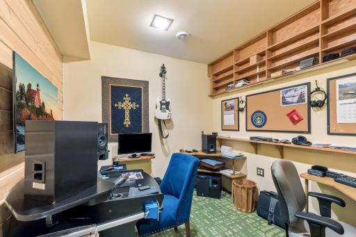 A rare bonus feature, this dedicated hobby room provides extensive built-in shelving, workspace, and storage for projects, crafts, collections, or creative endeavors.