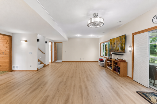 Spacious and inviting, the finished lower level provides plenty of room for relaxing, entertaining, hobbies, or a home office setup.
