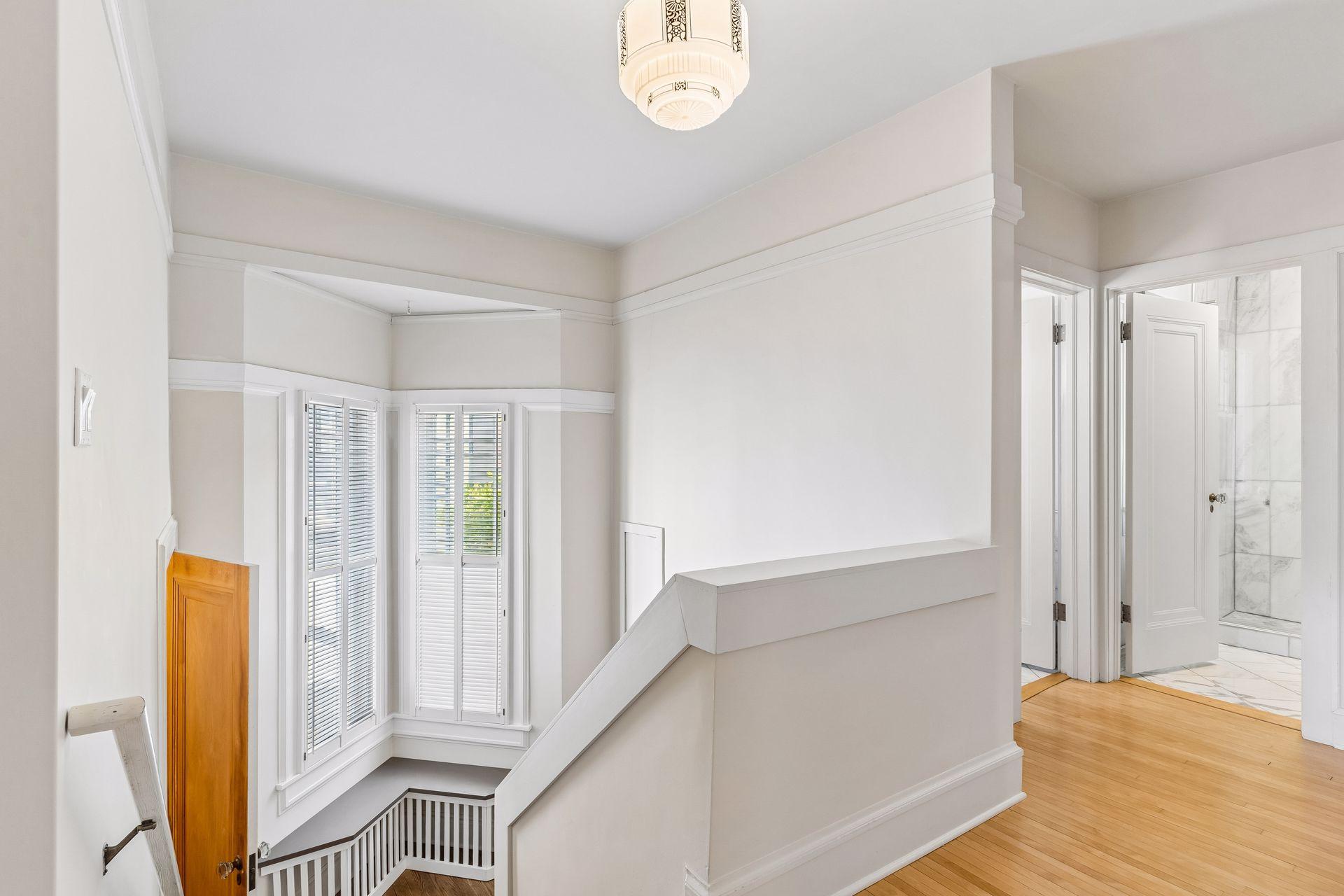 Sun-filled second-level spaces showcase beautiful views and a bright, airy feel.