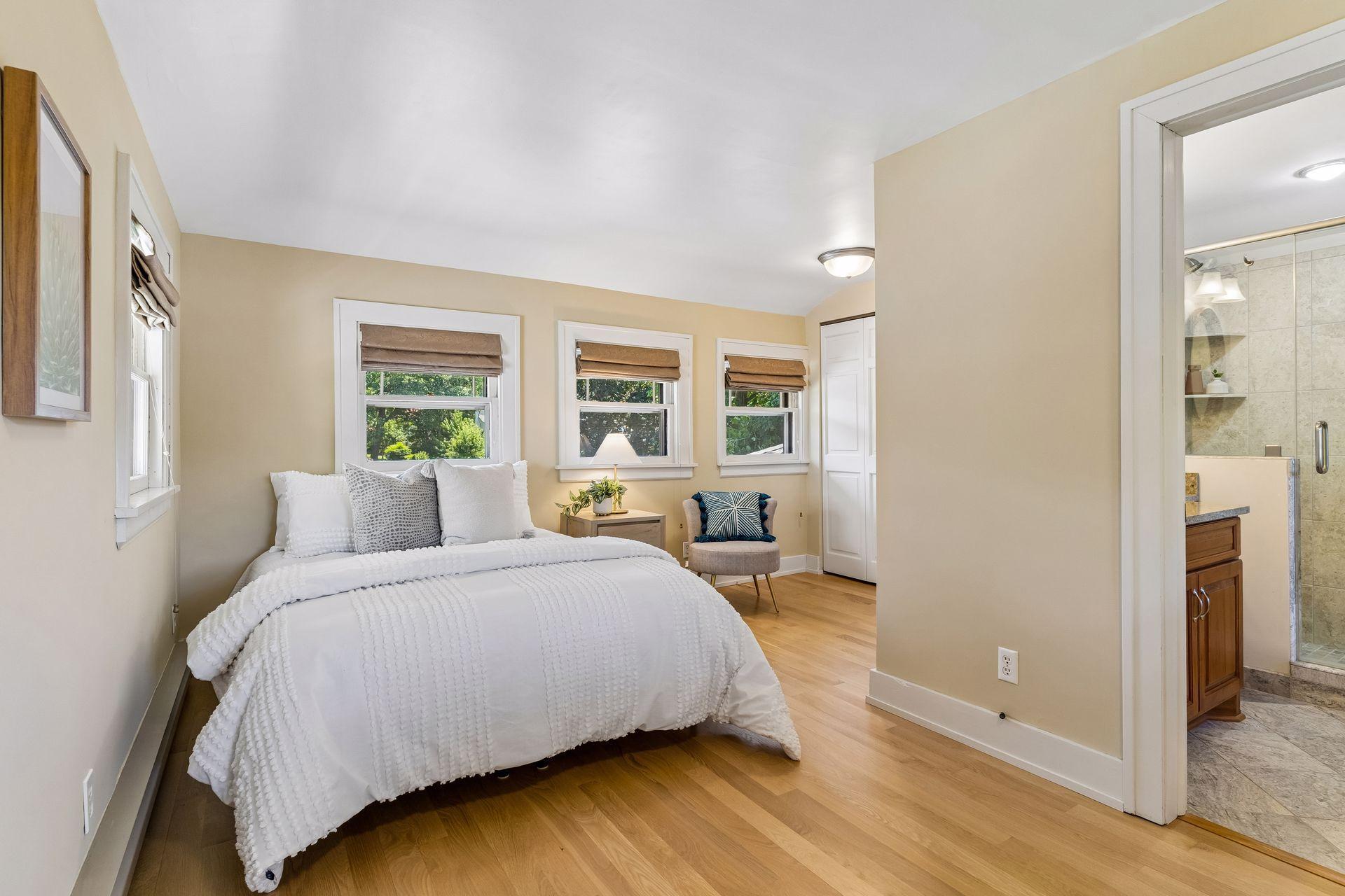 The third level offers a stunning fourth bedroom suite with hardwood floors and a peaceful retreat-like feel.