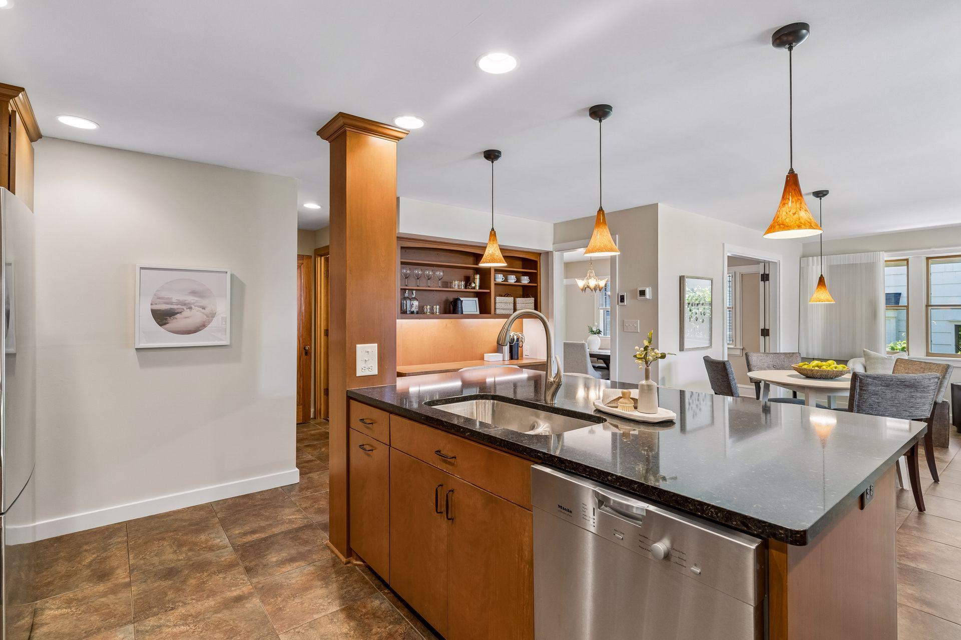Enjoy the warmth and comfort of heated tile floors in the kitchen.