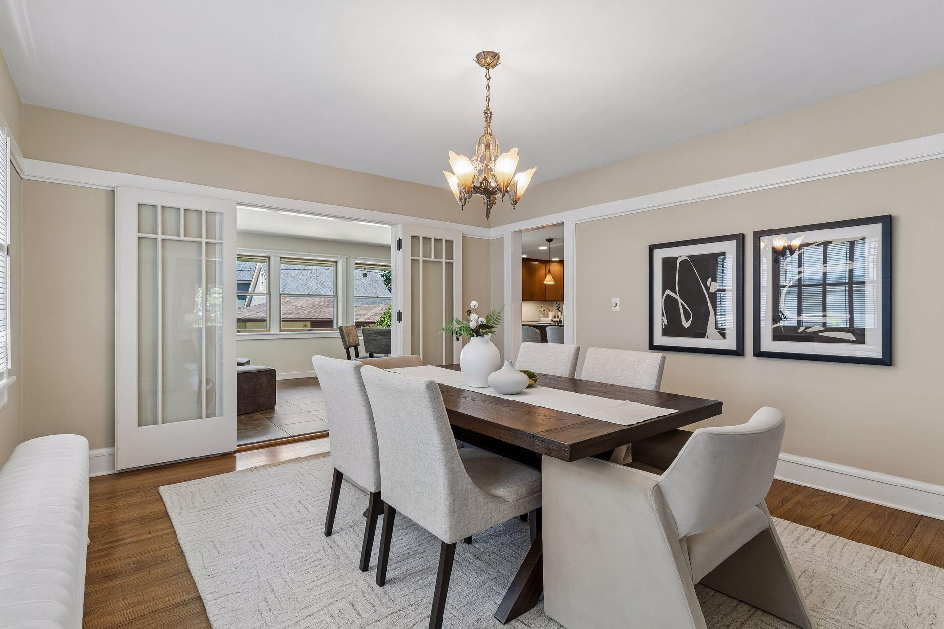 A natural transition leads from the formal dining room to a cozy informal dining space.