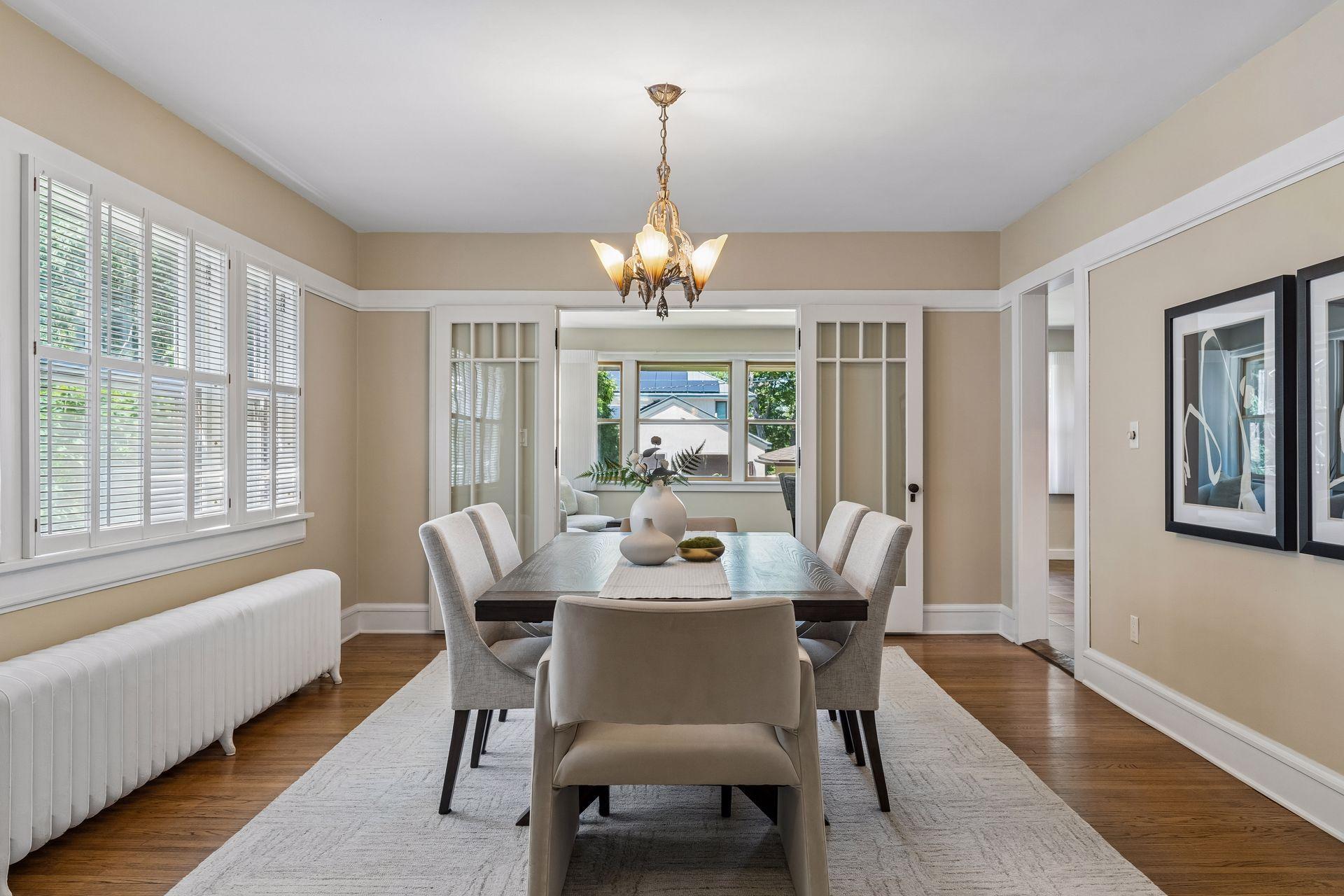 The spacious dining room provides the perfect setting for celebrations, dinners, and gatherings.