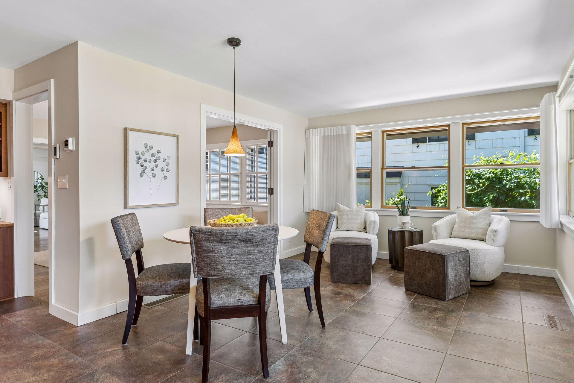 A spacious area perfect for extra seating while enjoying views of the beautiful yard.