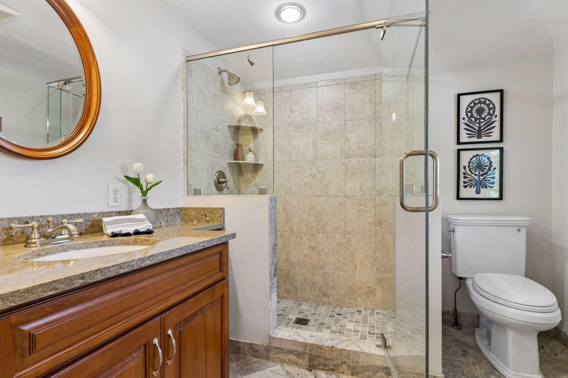 Beautiful custom tile details elevate this private third-level ¾ bath.