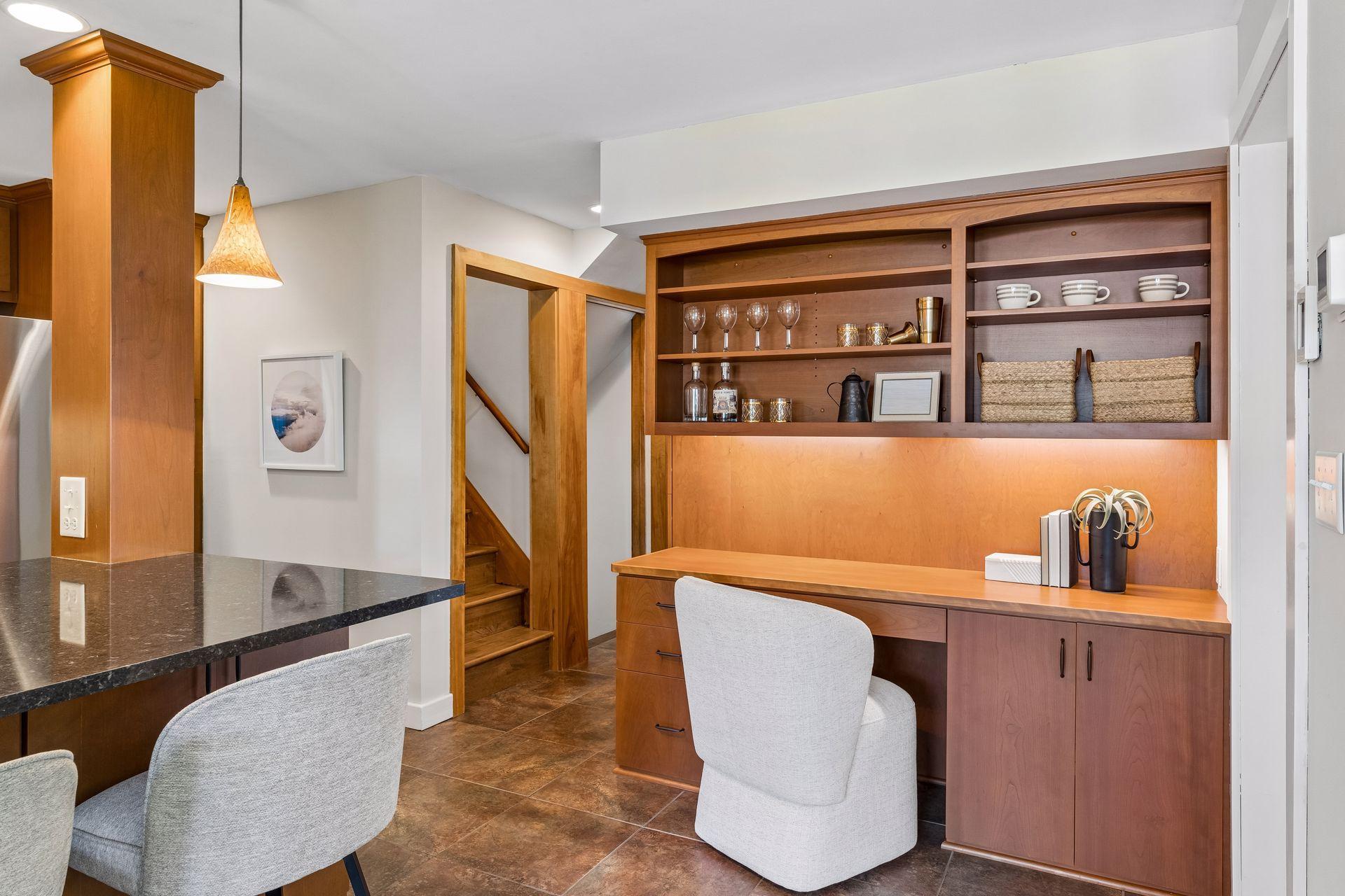 A convenient built-in workspace with plenty of storage keeps everything organized and within reach.