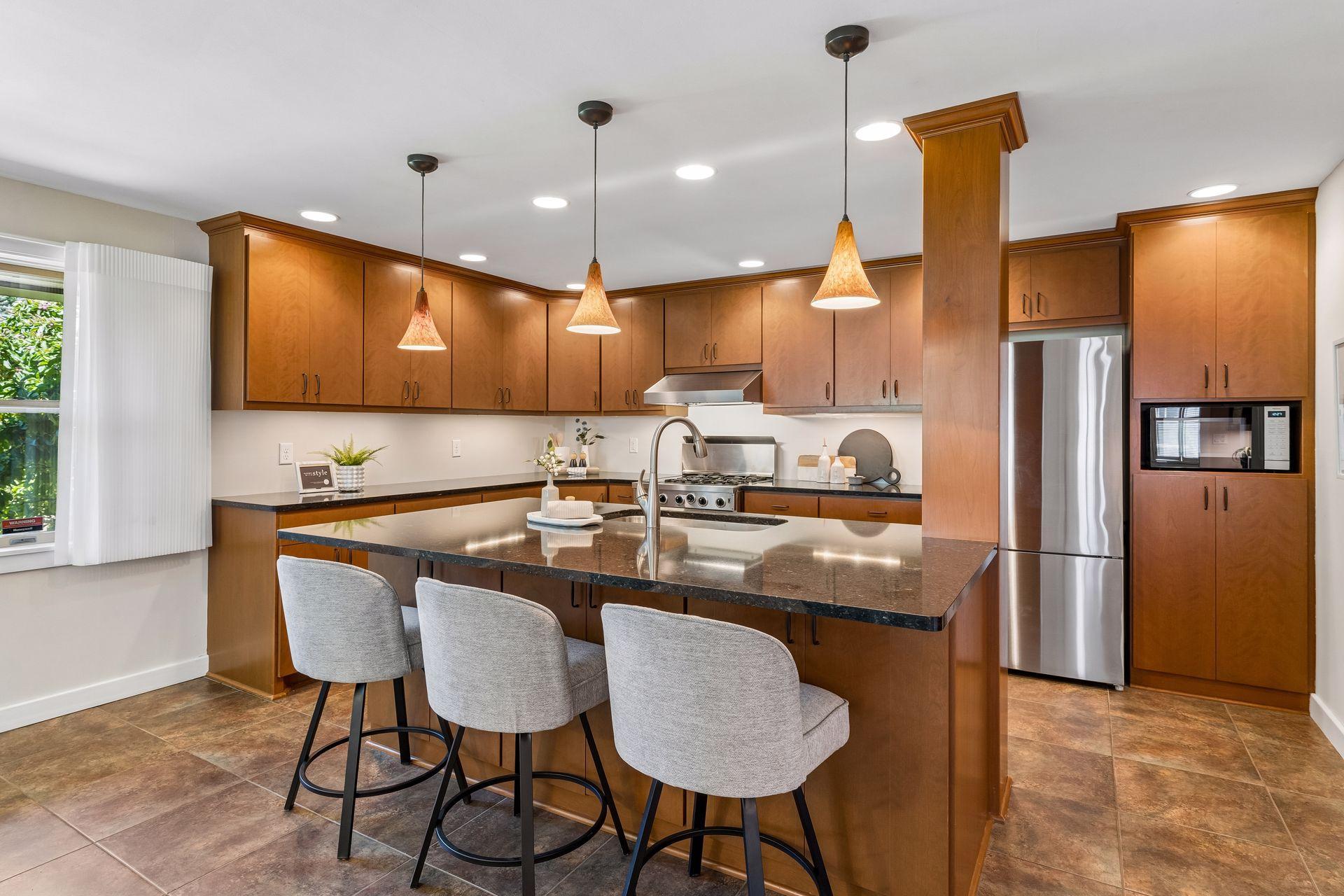Beautifully crafted floor-to-ceiling cabinetry brings warmth, character, and seamless functionality to the space.