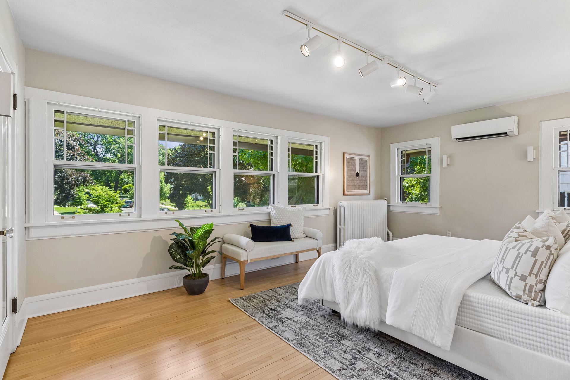 A peaceful second-level retreat features three spacious bedrooms, offering comfort and privacy for all.