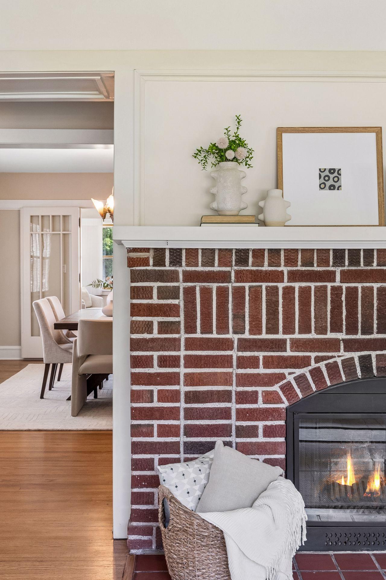 The inviting living room opens gracefully to the formal dining area.