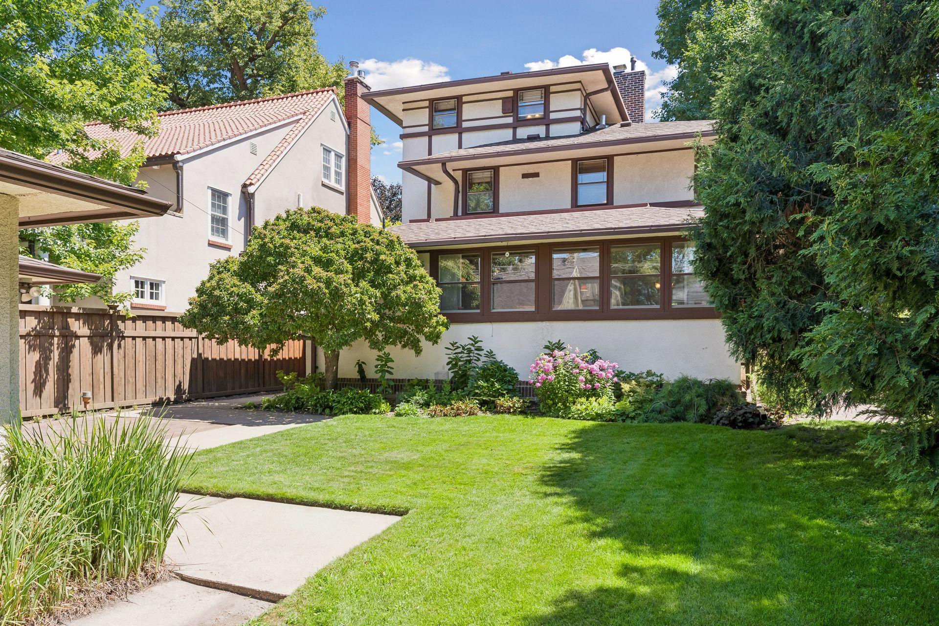 A private backyard oasis with abundant green space and natural beauty.