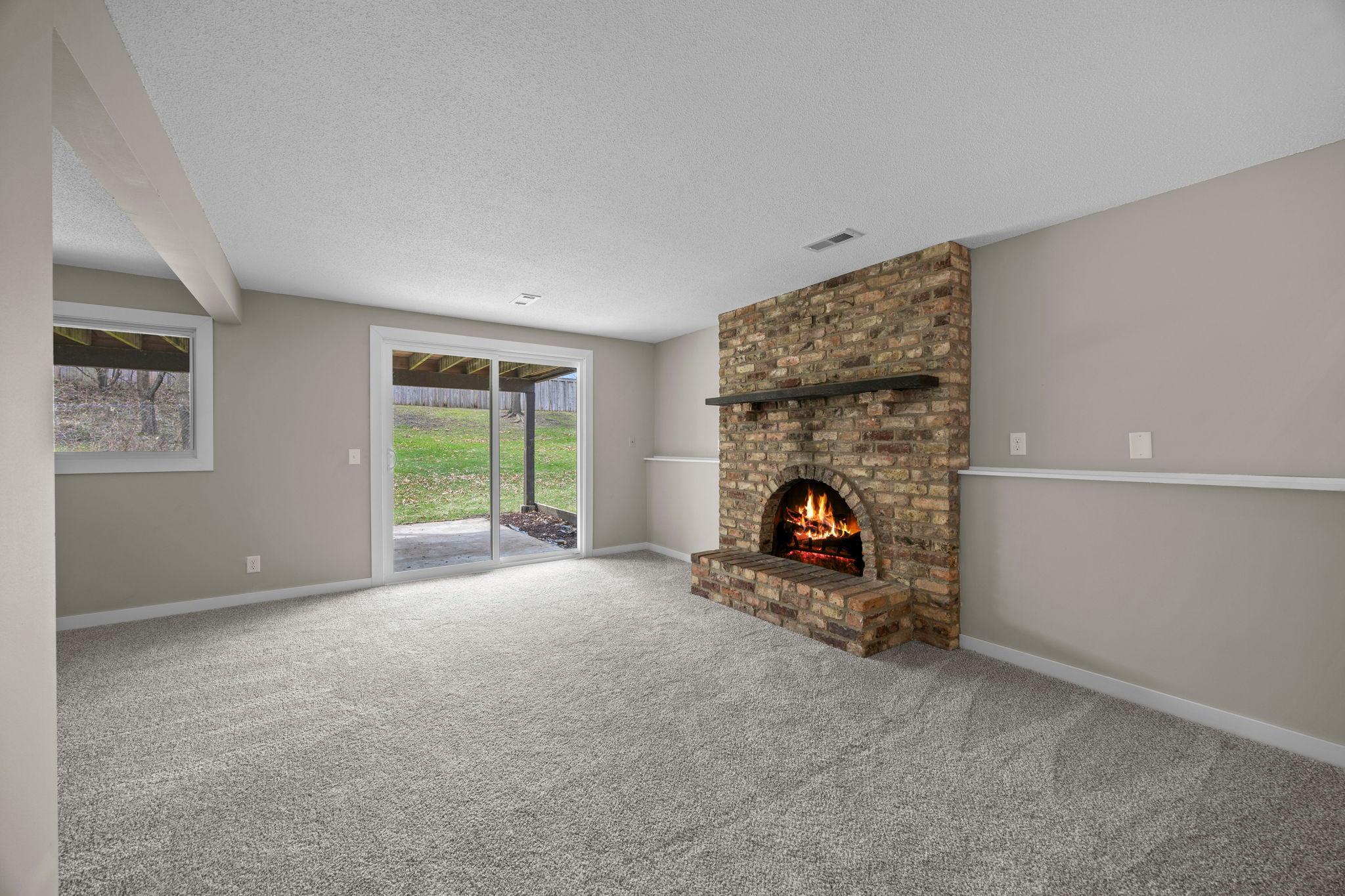 Wood burning fireplace in the lower level family room!