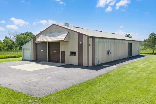 6,000 square foot building has 14" tall sidewalls and large overhead doors.