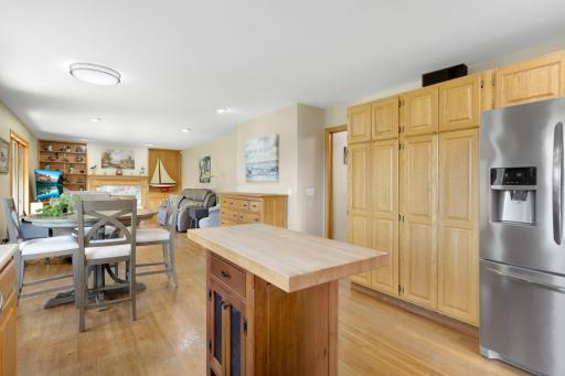 Custom pantry cabinets provide plenty of storage conveniently within the kitchen.