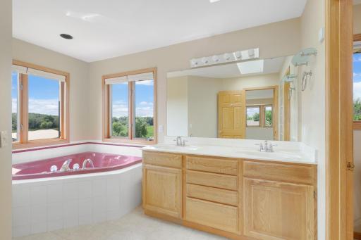 The primary bathroom is private and large at 16' x 8' in size and has a separate water closet and shower (not shown in photo).