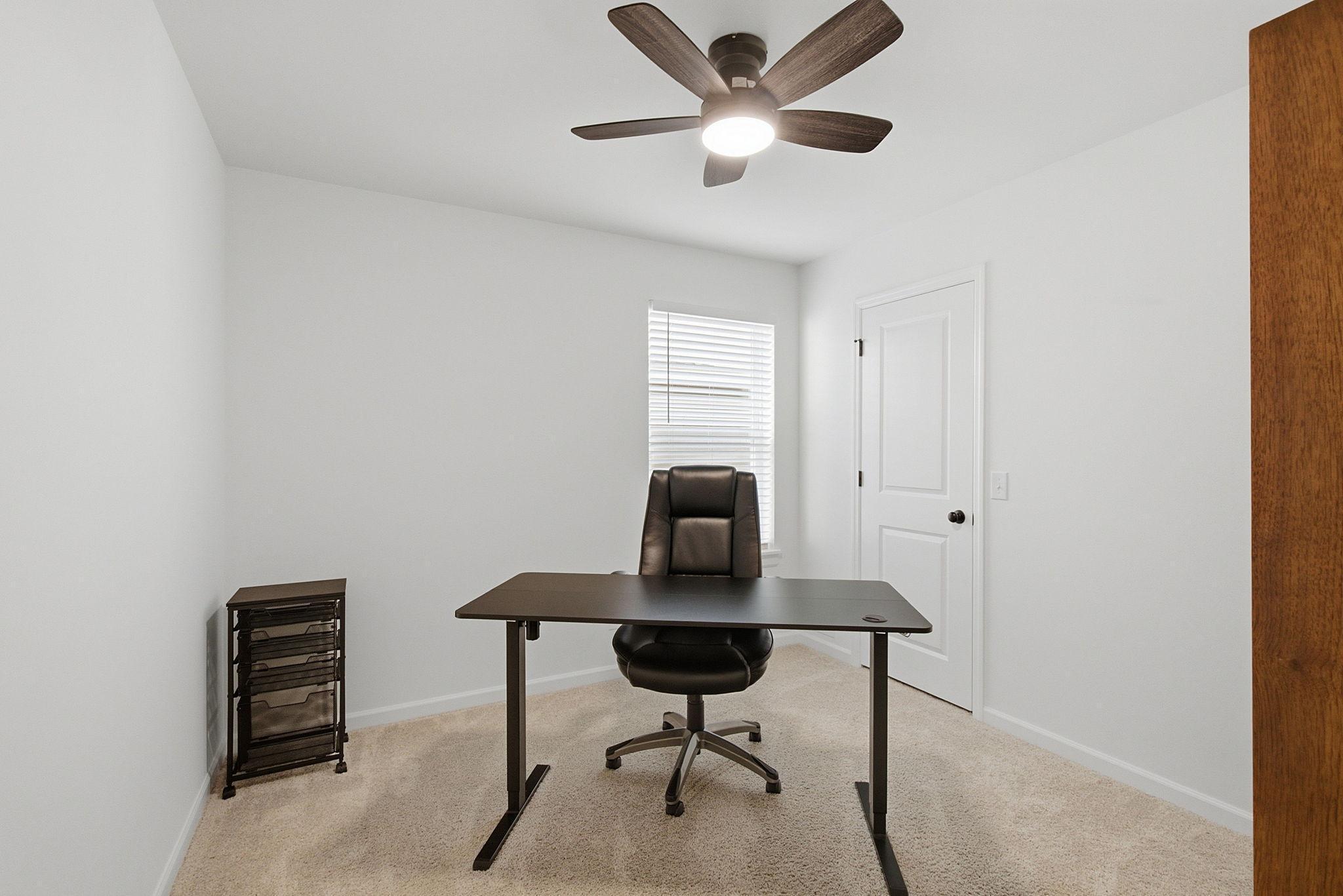All four bedrooms are located on the upper level, with one currently set up as a convenient office.