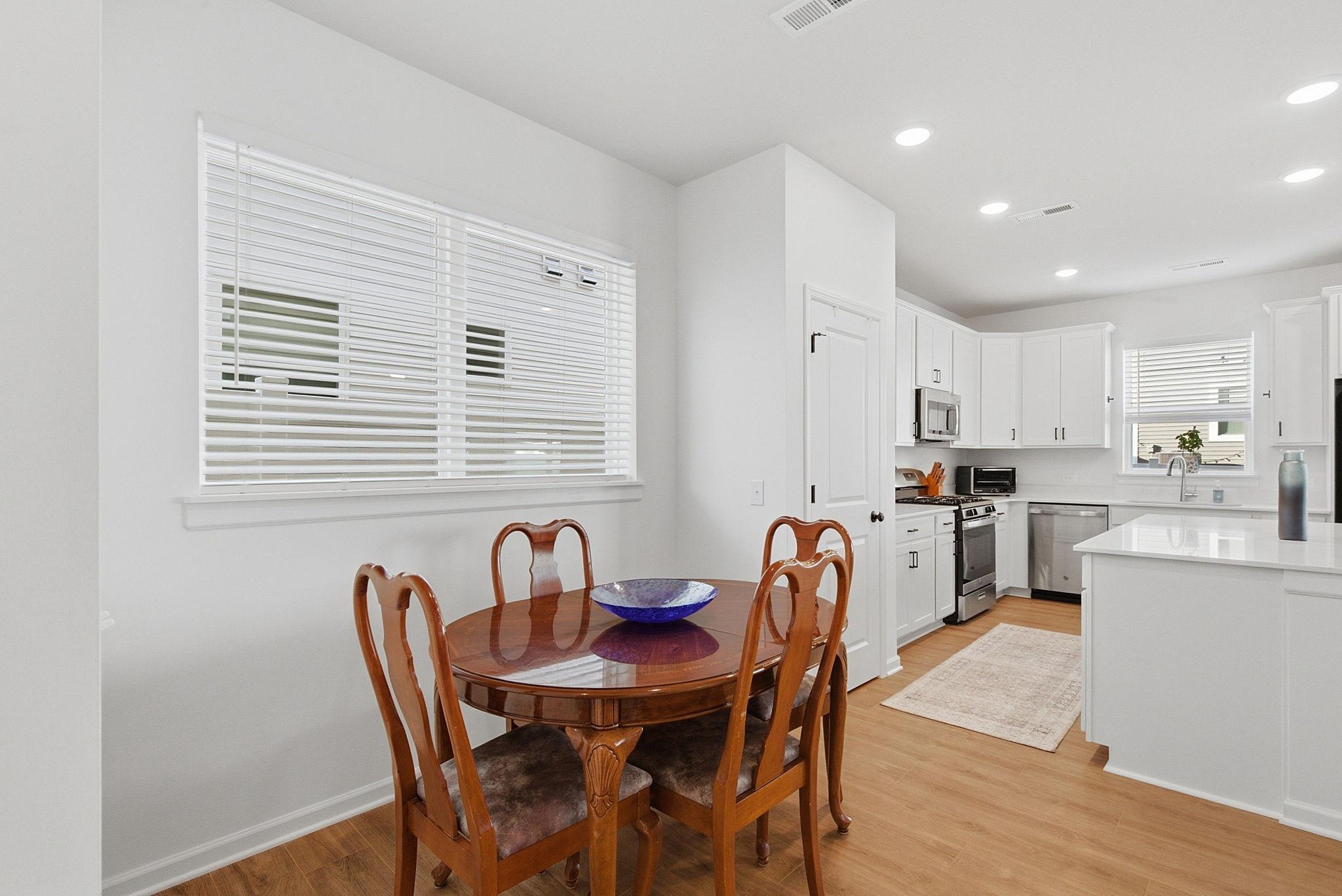 Enjoy a dedicated dining area that flows seamlessly into the large chef’s kitchen, featuring a spacious pantry for all your storage needs.