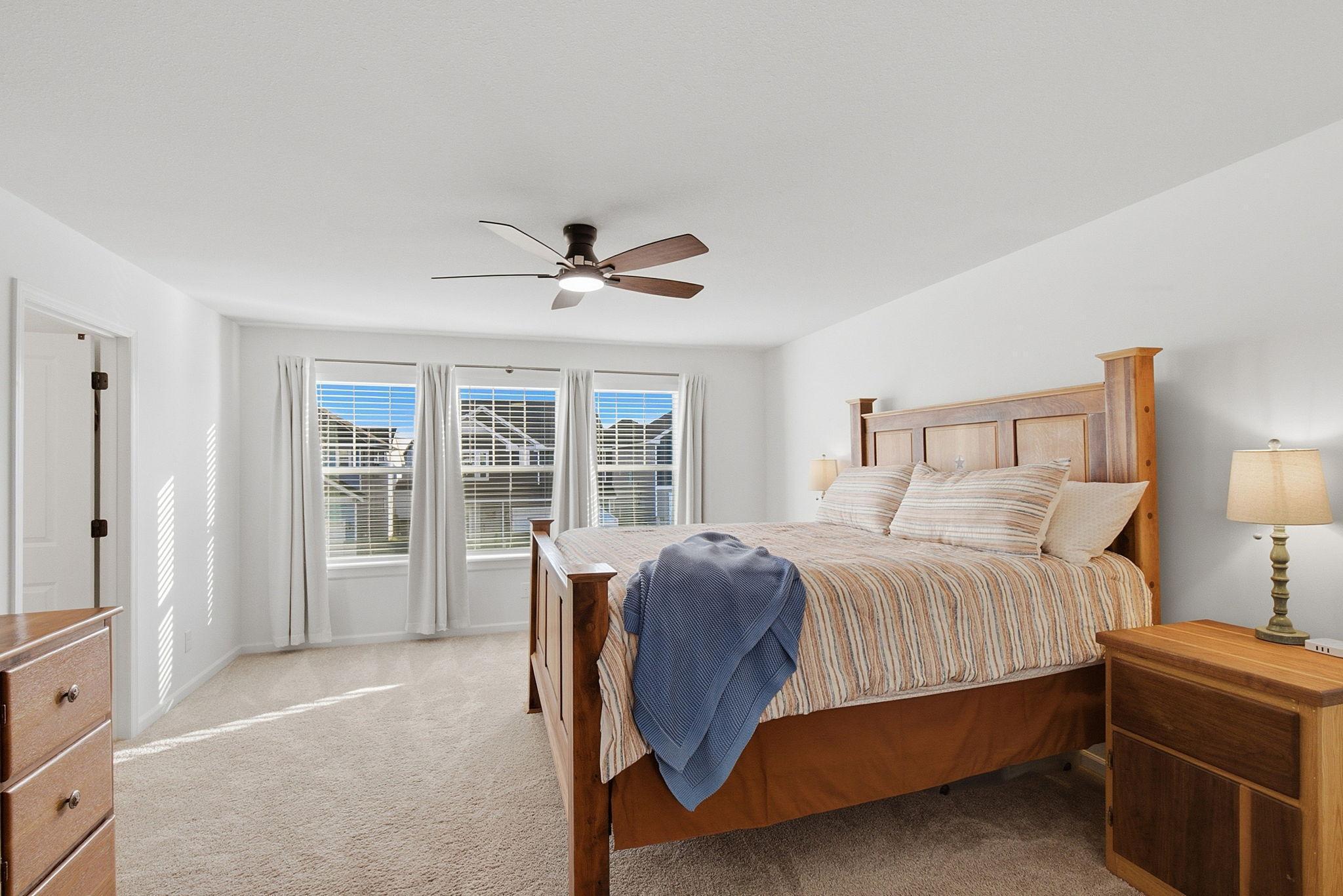 The massive owner’s suite is bathed in natural sunlight and connects seamlessly to the owner’s bathroom