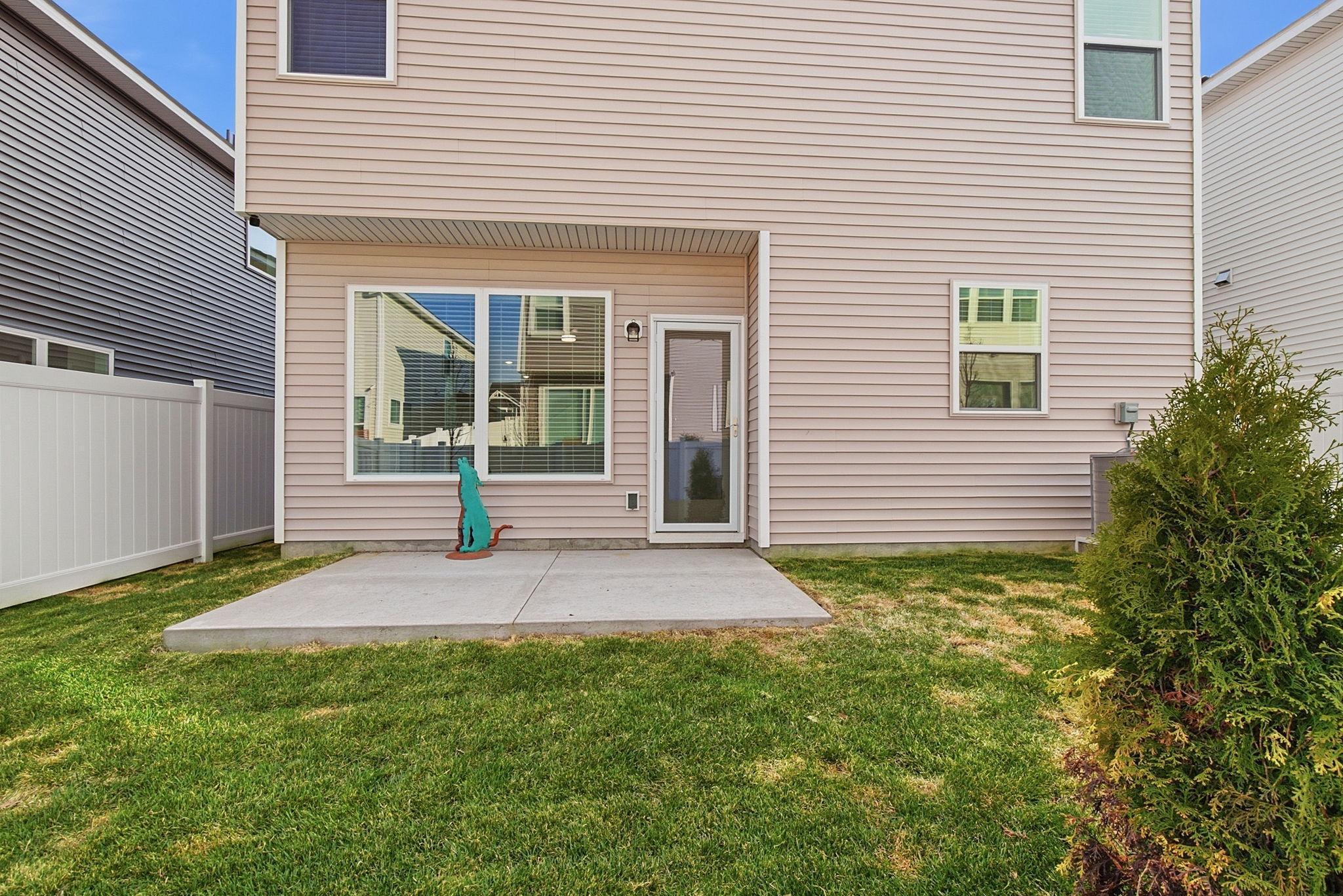 Enjoy a spacious patio that extends into a fully fenced-in yard, perfect for relaxing or entertaining.