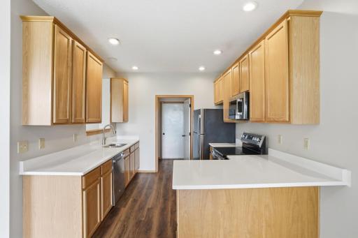 Open kitchen this is right near laundry, dining room and 4 season porch