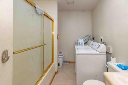 Upper unit full bathroom and laundry