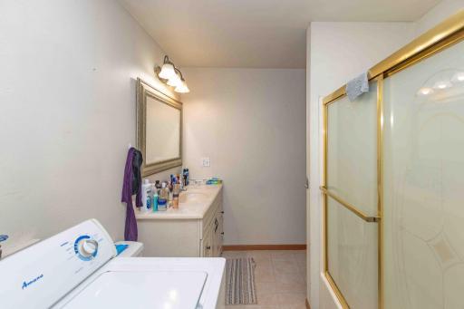 Upper unit bathroom and laundry