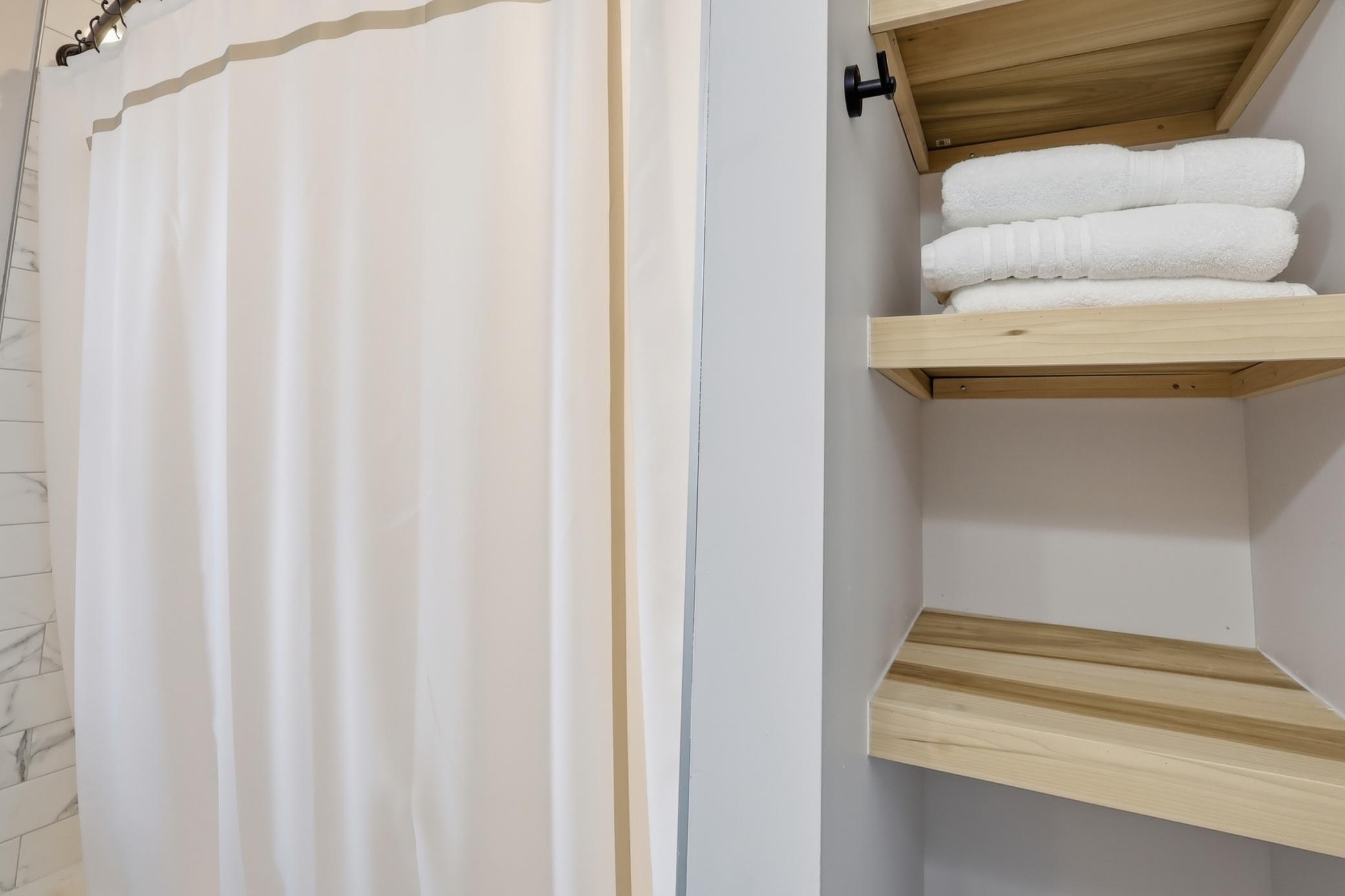 Upper level 2nd bath custom shelving