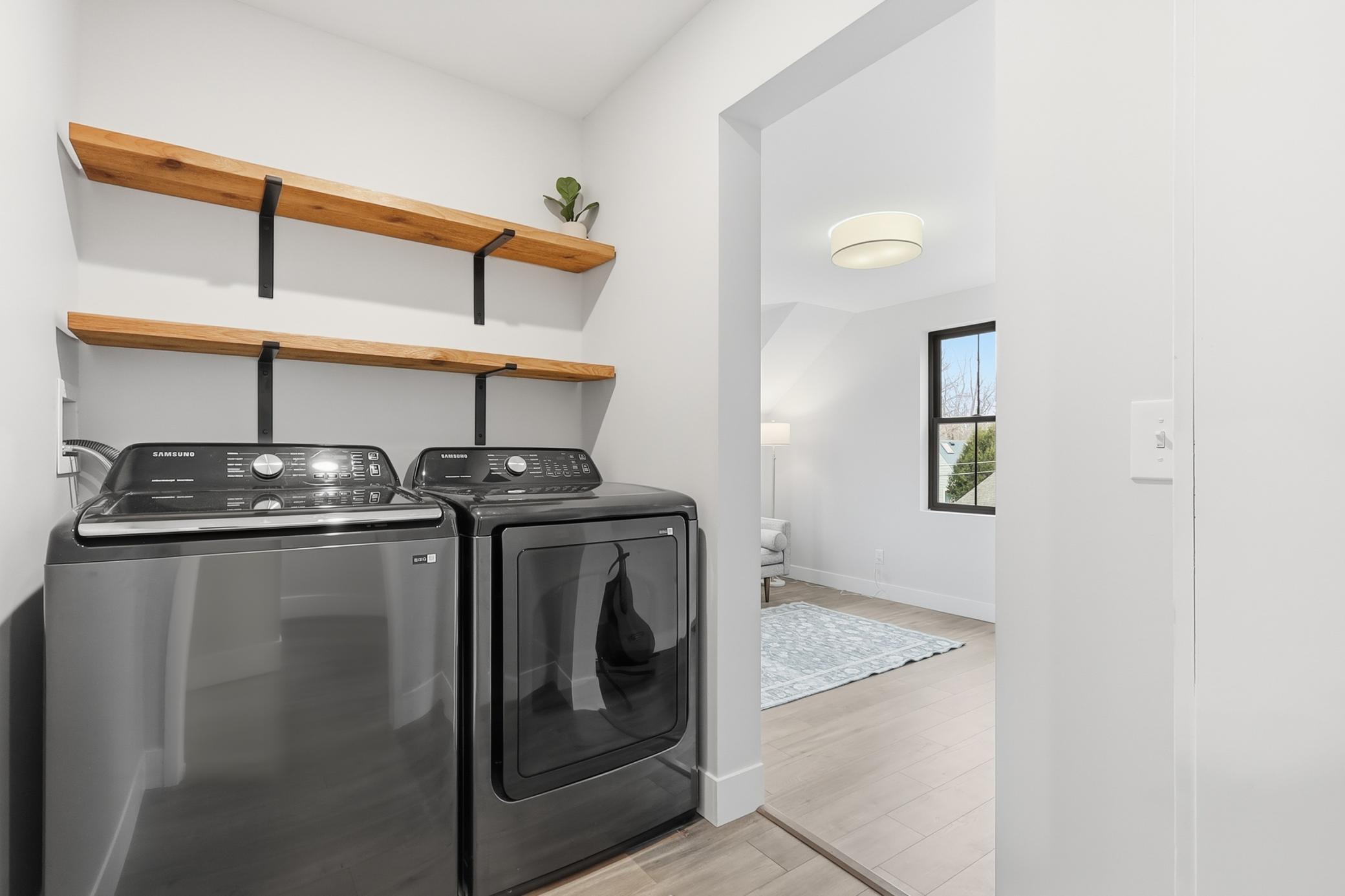 Upper level laundry with 2nd washer and dryer hook up in the basement
