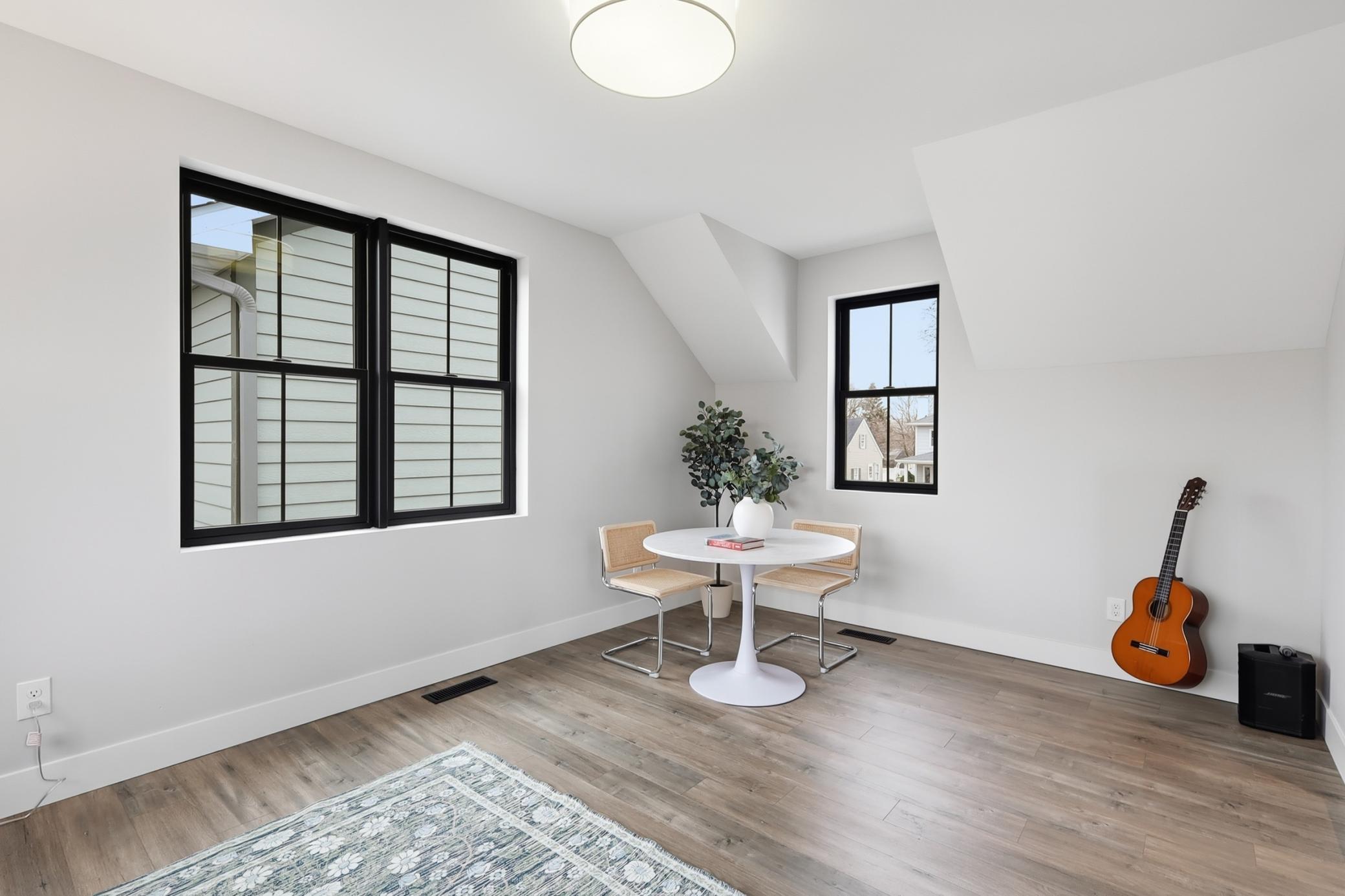 Upper level Sunroom. Plenty of space for games or reading!