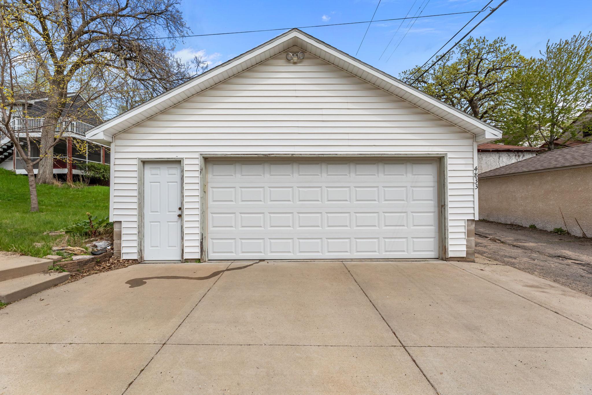 New concrete dirveway and two plus car garage is a bonus living in the city.
