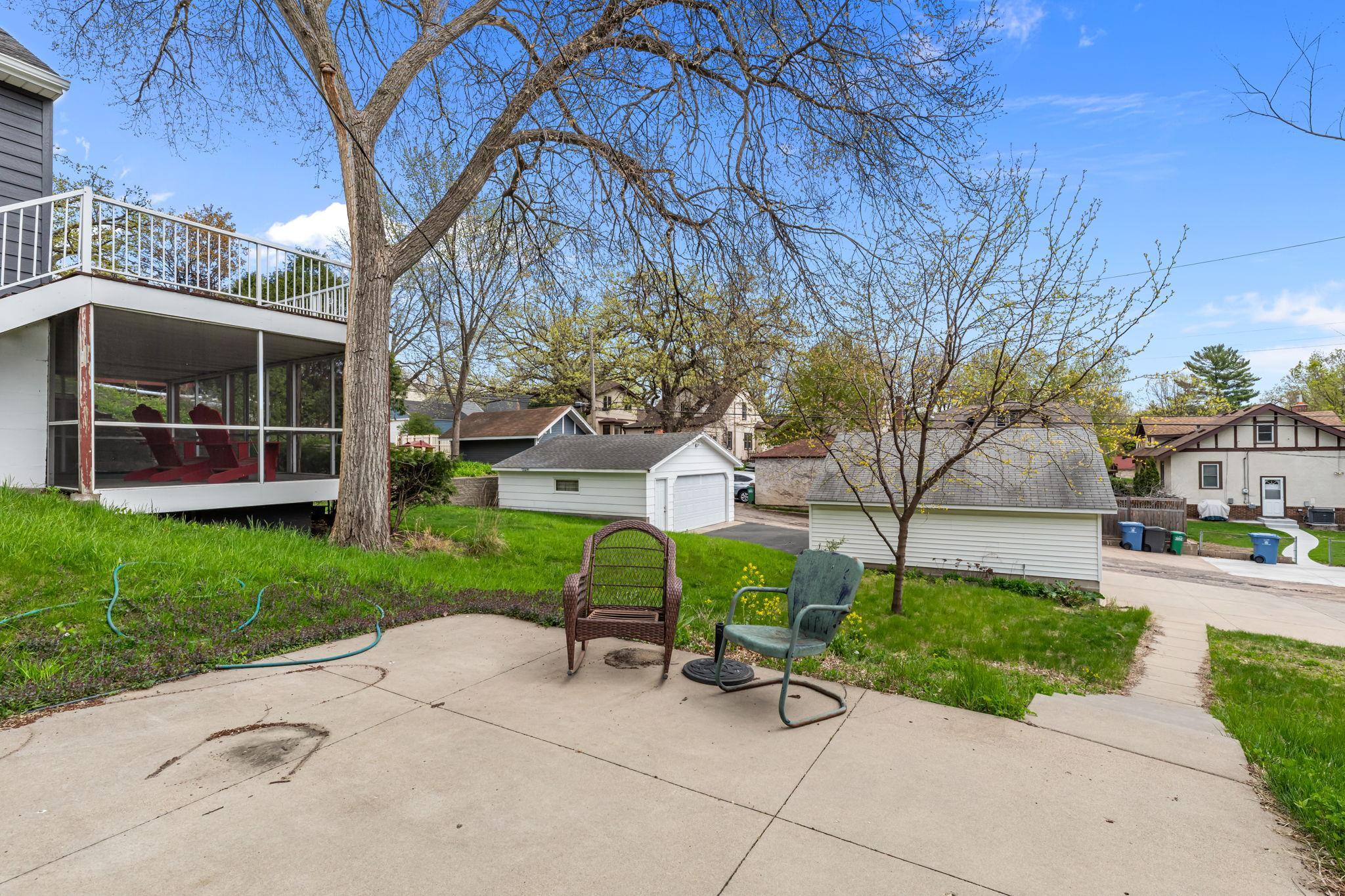 Huge concrete patio off the walk out basement that leads down to the garage.