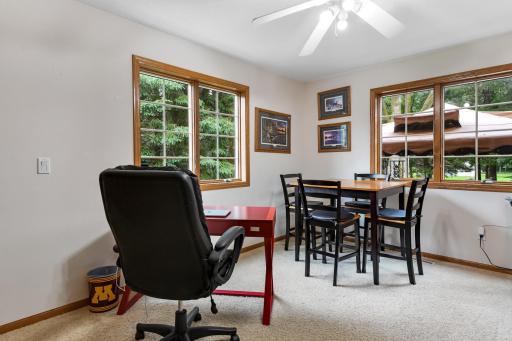 A main floor bedroom currently used as an office adds remote work flexibility