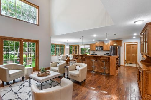 The huge center island steals the show in the well-equipped and exceptionally functional kitchen making meal prep and family engagement a breeze