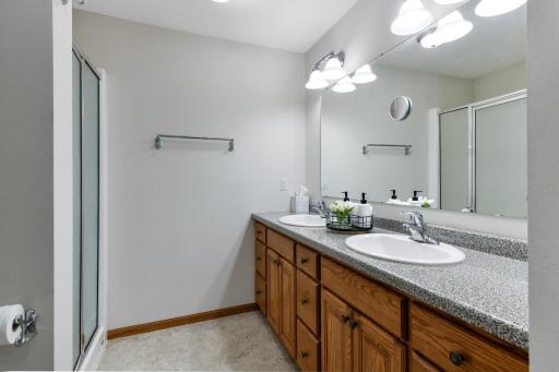 Dual vanity and separate shower for exceptional shareability of space